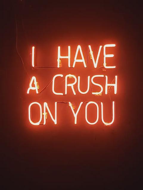 A neon sign spelling out ‘I have a crush on you’